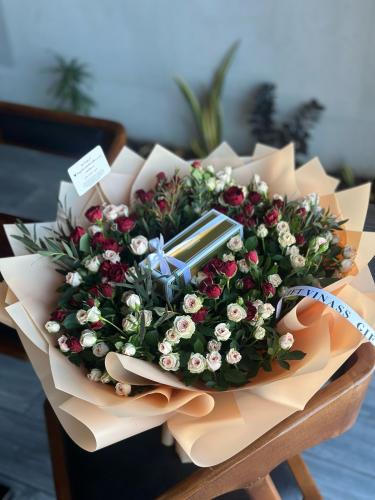 باقة ورد وردي بتغليف راقي - هدايا الطائف